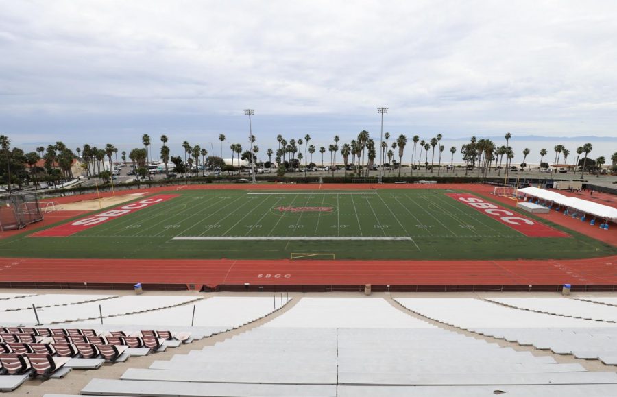 From the top of the bleachers at La Playa Stadium, the black gravel that was laid down as a base for the artificial turf 11 years ago can be seen almost as clearly as if you were down on the field on Feb. 1, 2020, at City College in Santa Barbara, Calif. The holes and ripped-up turf can also be seen from a distance.