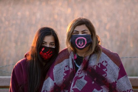 From left, Robyne Redwater, and Marianne Parra arrived for the second day of sit-in protests at 5 a.m. on Feb. 26, 2021 at the San Marcos Foothills preserve in Santa Barbara, Calif.have been following the issue closely for over a month and one of Parra's daughters, Noemi Aidee Tungüi, was one of the eight arrested and released during Thursday's sit-in protest.