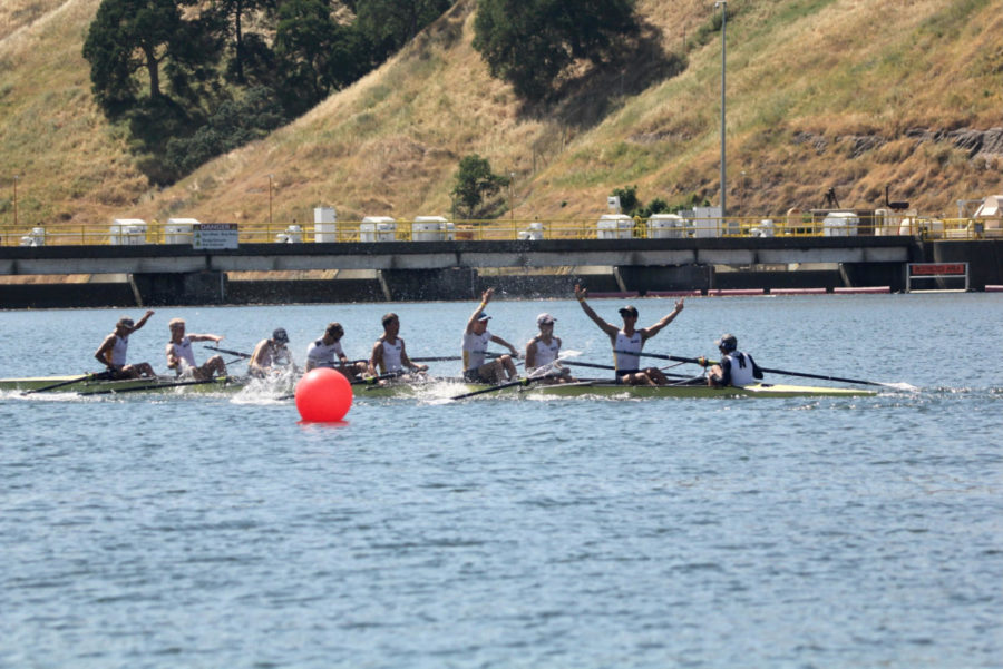 Adam McDonald (Five from the right), and his teammates celebrate a first place win during the lightweight eight+ event during the 2019 USRowing Southwest Youth Regional Championships.