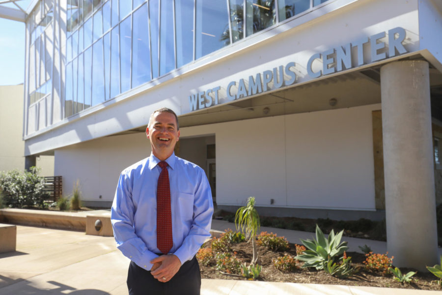 Justice Studies Professor David Saunders stands outside the West Campus Center where he teaches when in-person classes are in session. Saunders was a police officer for eight years and takes insight from all perspectives when it comes to improving the police response to mental health crisis calls.