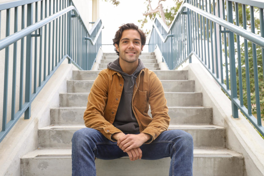 Cameron Olandt, the 2020-2021 recipient of the The William Olivarius Biology Scholarship on the steps of the Physical Science building on April, 22 at City College in Santa Barbara, Calif. Olandt said he did not expect to receive the scholarship, but that he is looking forward to the opportunities it will help provide.