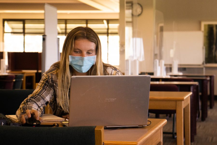 Kirsten Milliron catches up on homework in the Luria Library during its official reopening on Sept. 9, at City College in Santa Barbara, Calif. Milliron said the quiet and calm atmosphere of a library is exactly what she’s needed in order to get her work done properly.