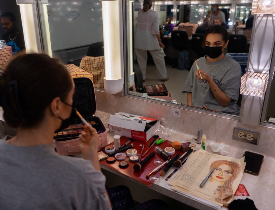 Stephanie Brown applies make-up around her eyes during Theatrical Make-up class on Sept. 8, 2021 in DM130 at Santa Barbara City College in Calif. The students draw out the final design on paper first, then apply it to themselves.