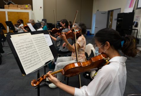 Salome Huang and the rest of the violin section rehearse the first movement of Dvorak’s New World Symphony for the Symphony Orchestra class on Sept. 7, 2021 in DM105 at Santa Barbara City College in Calif. Huang plays second violin for the City College Orchestra.