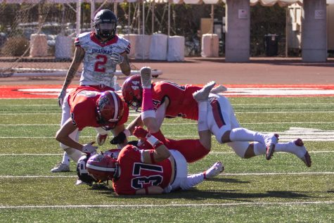 The City College football defensive team tackle a runner from La Pierce College on Saturday, Oct. 16 at City College's La Playa stadium in Santa Barbara, Calif. City College beat LA Pierce 60-6.