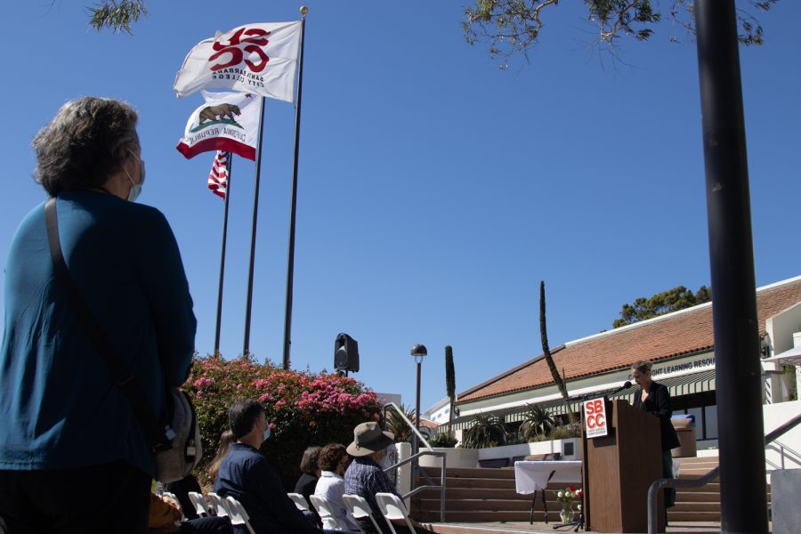 DSPS Director Jana Garnett recalls times she shared with deceased DSPS faculty member Janet Hose during a flag lowering ceremony to honor Hose’s life and services to City College on Monday, Oct. 18 outside of The Luria Library in Santa Barbara, Calif. Hose’s friends and colleagues spoke of her, with the reoccurring theme of how cheerful and helpful she was.