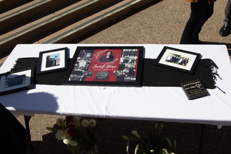 A table laden with pictures of deceased DSPS faculty member Janet Hose during a flag lowering ceremony to honor her life and services to City College on Monday, Oct. 18 outside of The Luria Library in Santa Barbara, Calif. Apart from helping students, Hose worked to improve the DSPS's online and software programs during her time at City College. 