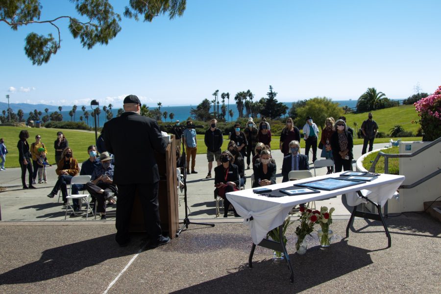 IT User Support Services Director and Campus Chaplain Jason Walker delivers comforting words to a congregation of mourners in honor and remembrance of deceased DSPS faculty member Janet Hose during a flag lowering ceremony to honor her life and services to City College on Monday, Oct. 18 outside of The Luria Library in Santa Barbara, Calif. Those who spoke at the ceremony recalled Hose being a positive influence not only on students of DSPS, but on the staff as well.