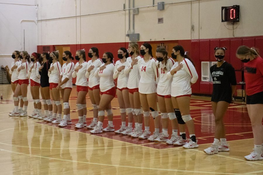 The women’s volleyball team lines up to honor the American flag during the national anthem before a game against the Ventura College Pirates on Oct. 6 at City College in Santa Barbara, Calif. The City College Vaqueros swept the Ventura Pirates 3-0.