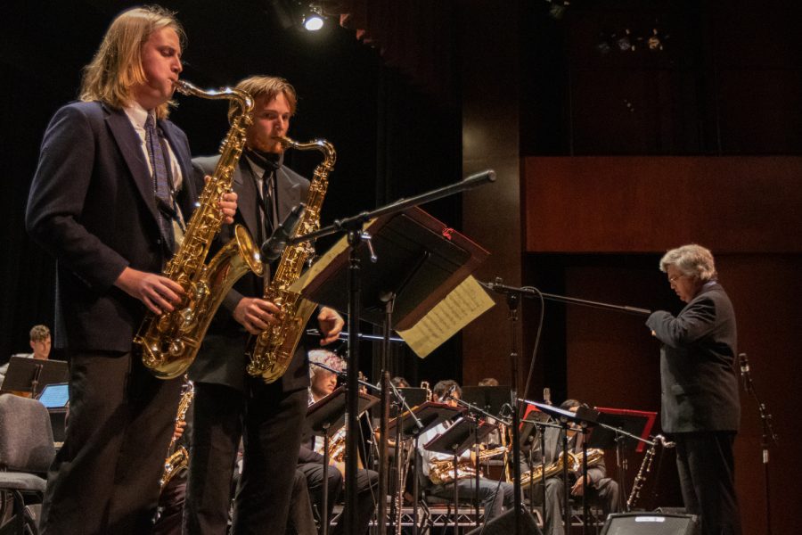 From left, Simon Blondell and Eli Nania swap sax solos during the Lunch Break’s performance of Dan Gailey’s big band standard “Attack of the Tenor Titans on Monday, Nov. 15 at City College’s Garvin Theatre in Santa Barbara, Calif. During solos, conductor Jim Mooy walked to the side to let the audience concentrate fully on the players.