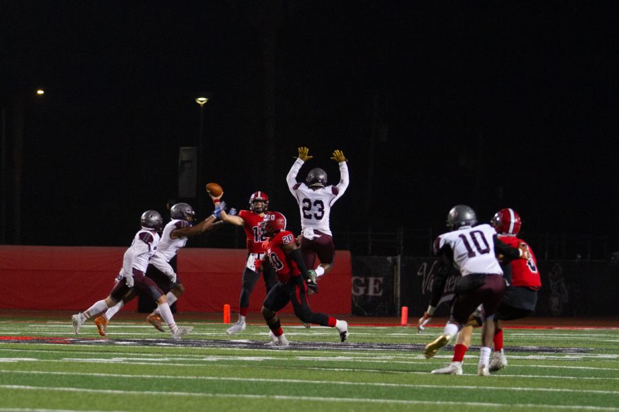 City College quarterback No. 12 Alex Johnson searches for an open man during the game against Antelope Valley on Oct. 30 at La Playa Stadium in Santa Barbara. Antelope Valley defeated the Vaqueros 37-22.