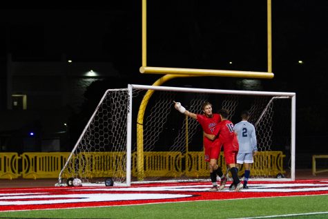 From left, Bart Muns celebrates with teammate Will Demirkol after scoring a goal against LA Mission College on Nov. 9 at City Colleges La Playa Stadium in Santa Barbara, Calif. His goal put City College ahead 2-1.