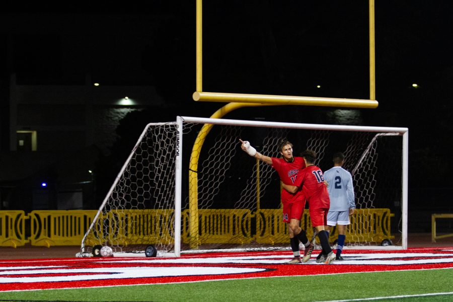 From left, Bart Muns celebrates with teammate Will Demirkol after scoring a goal against LA Mission College on Nov. 9 at City College's La Playa Stadium in Santa Barbara, Calif. His goal put City College ahead 2-1.