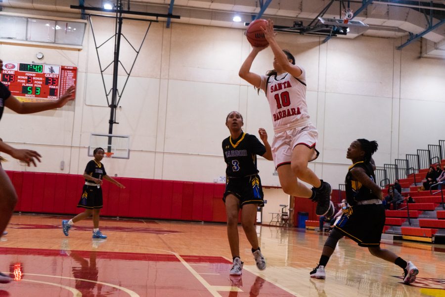 No. 10, Katrina Regalado, leaps into the air for a two-pointer on Nov. 10 at the Sports Pavilion at City College in Santa Barbara, Calif. Regalado scored 20 points throughout the game.