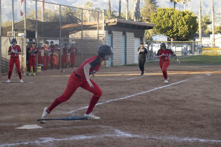 From left, Natalie Depasquale runs to first after hitting a base hit while her teammate Jade Leoffier runs to home during City College's game against San Bernardino College on Feb. 5 at City College's baseball diamond in Santa Barbara, Calif. The San Bernardino Wolverines eliminated the City College Vaqueros two games to zero.