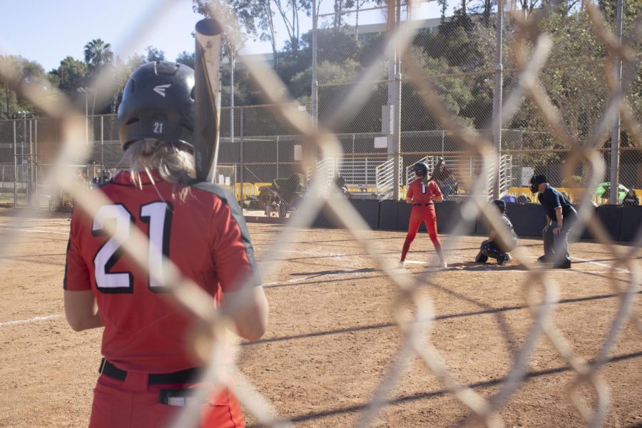 From left, Sarah Hammonds readies her swing while Natalie Depasquale winds up for a hit during City College's game against San Bernardino College on Feb. 5 at City College's baseball diamond in Santa Barbara, Calif. The San Bernardino Wolverines eliminated the City College Vaqueros two games to zero.