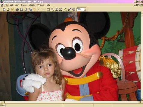 Melissa Garcia poses with Mickey Mouse in 2006 at Disney World in Orlando, Florida.