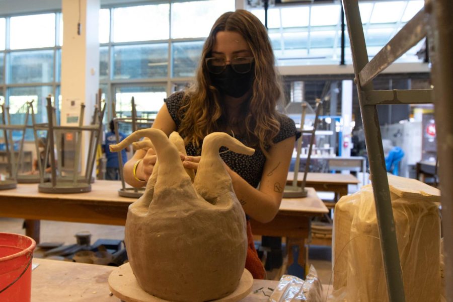 Nursing+student+Sage+Heidkamp+sculpts+the+top+of+her+most+recent+sculpture+on+Wednesday%2C+March+2+at+City+Colleges+art+department+in+Santa+Barbara%2C+Calif.+City+Colleges+ceramic+department+emphasizes+encouraging+students+creativity+and+seeks+to+inspire.