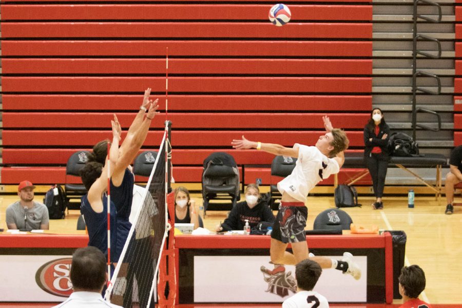 Jack McManus spikes to score against El Camino during their game on March 16 at the Sports Pavilion in Santa Barbara, Calif. The City College Vaqueros lost to the El Camino Warriors 3-0.