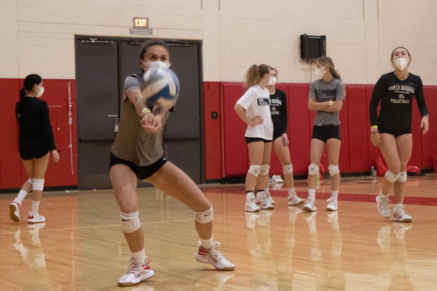 City College’s women’s volleyball team line up to practice setting the ball for teammates to spike over the net on Thursday, Feb. 24 at City College in Santa Barbara, Calif. The players said being on the team helps them build their concentration and focus.