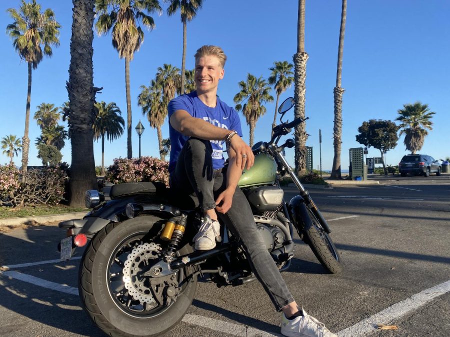 Jan Kamillo Kreitzberg leans on his motorcycle after class on Feb. 28 at City College in Santa Barbara, Calif.