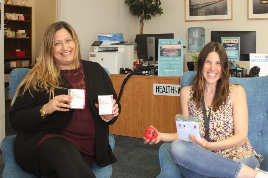 From left, Personal Counselor and Anchor Program Coordinator Lacey Peters and Student Program Advisor and Associate Social Worker Becky Bean display hygiene kits and other resources provided by The Well on Thursday, March 11 at City Colleges ECC-21 in Santa Barbara, Calif. “We are here to help, support, and encourage our students,” Bean said.