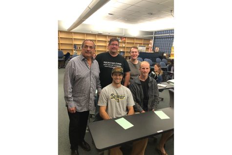 Former Assistant Professor in Nursing David Martinez (left) poses with his students during a class on March 21 at City College in Santa Barbara, Calif. Martinez, who was popular among his students, was 67 when he passed. Courtesy of Sarah Orr.