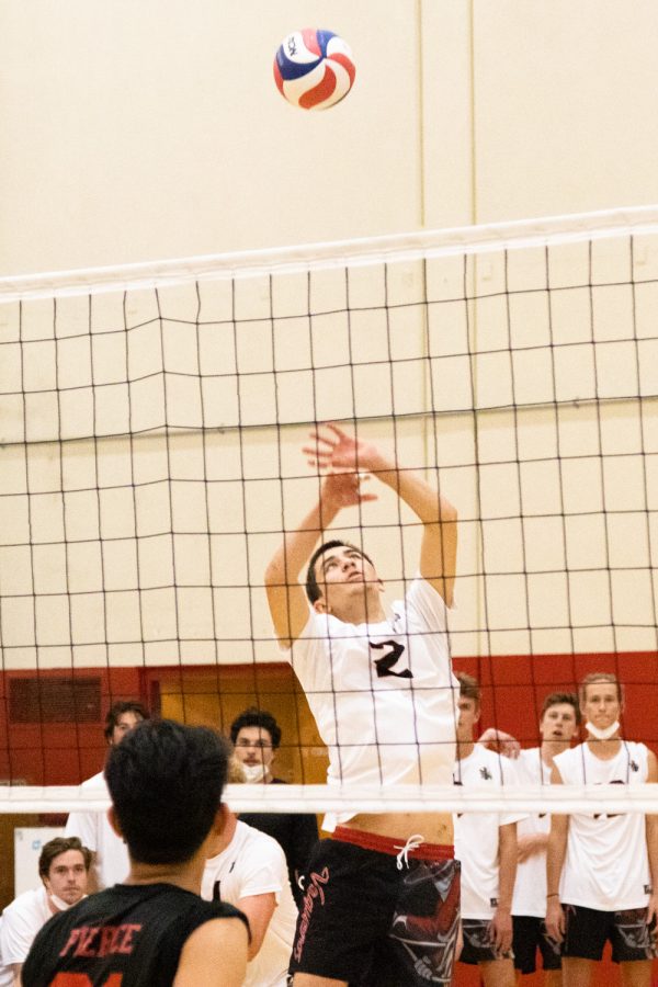 City College setter Carter Cottrell, 2, goes up for a spike during a game against LA Pierce College on March 30 at the sports pavilion in Santa Barbara, Calif. City College swept LA Pierce 3-0.