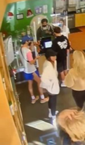 Security Camera still of Abril Jimenez serving Harry Styles and his manager at Blenders in The Grass in Montecito in Calif.