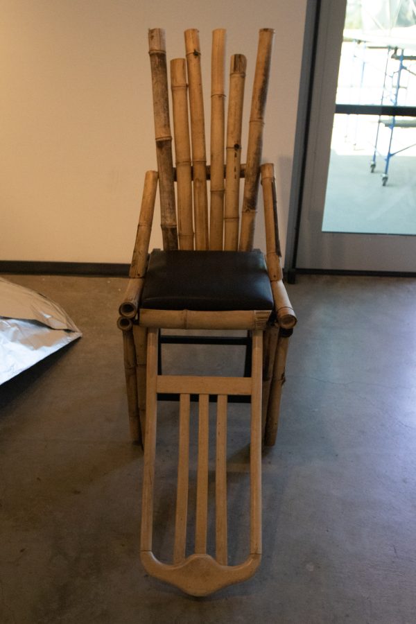 Art student Alec McLaughlin's piece, "King Julian's Throne," on April 5 at the "Structure and Skin II" Atkinson Gallery pop-up exhibition at City College in Santa Barbara, Calif. This piece was made by connecting bamboo to two wooden chairs with nails.  