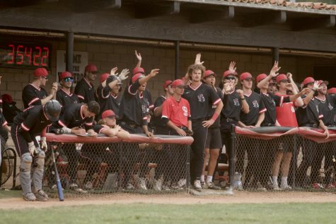 Players wave goodbye to the opposing pitcher following a visit to the mound Tuesday, April 26 at Pershing Park in Santa Barbara, Calif. Both teams displayed heated emotion in the late back and forth game.