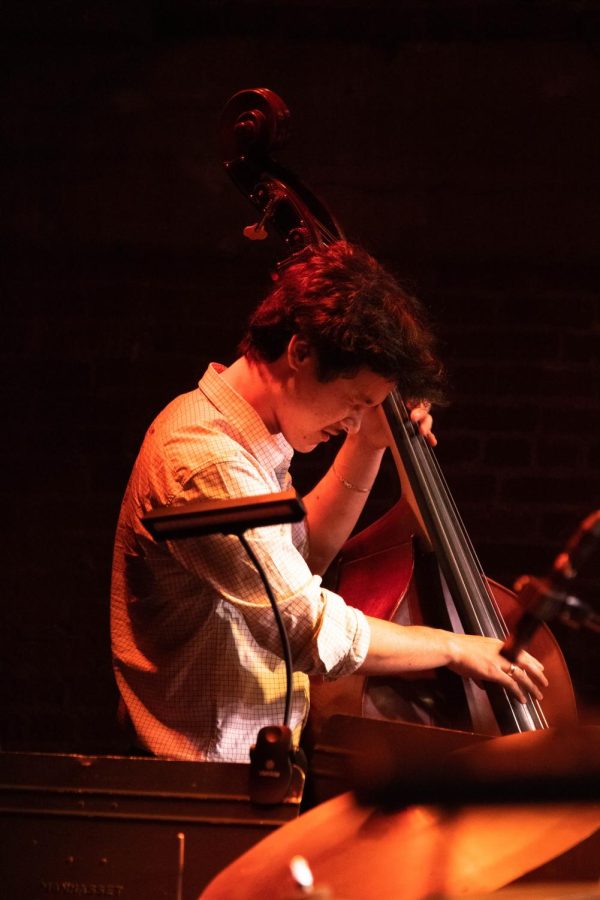 Jack Egawa slaps the double bass during a jazz show on Monday, April 11 at SOhO Restaurant and Music Club in Santa Barbara, Calif. Egawa played with the David Campos group.