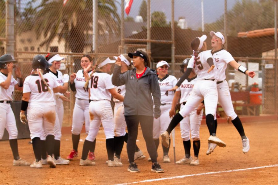 Naveah Freitas, No. 5, and Sarah Hammonds, No. 21 chest bump in celebration after winning against the Cuesta Cougars 9-8 on Thursday, March 31 at Pershing Park in Santa Barbara, Calif. The win brought the Vaqueros back to .500 in the WSC North.