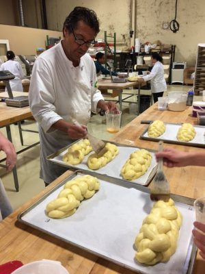 Chef Stephane Rapp preps challah rolls several years ago at a baking institute in San Francisco, Calif.
