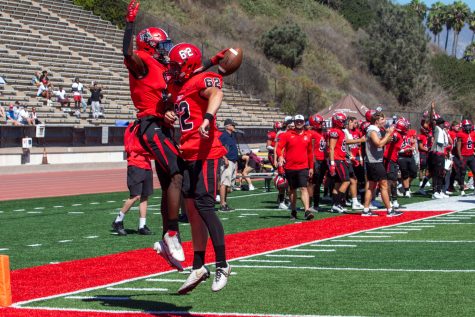 Number 62, kicker Hunter Simmons, celebrates with defensive back Jamari Cannon after Cannon scored his first touchdown of the game on Saturday, Sept. 24, 2022 at La Playa Stadium in Santa Barbara, Calif.