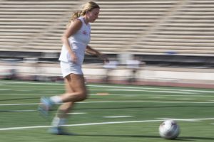 Forward Aly Springer (No. 23) lines up the ball for a kick on goal during a women’s soccer practice on Oct. 19 at La Playa Stadium in Santa Barbara, Calif. While the players ran a wide variety of drills, Springer emphasized offensive exercises to solidify her shooting ability.