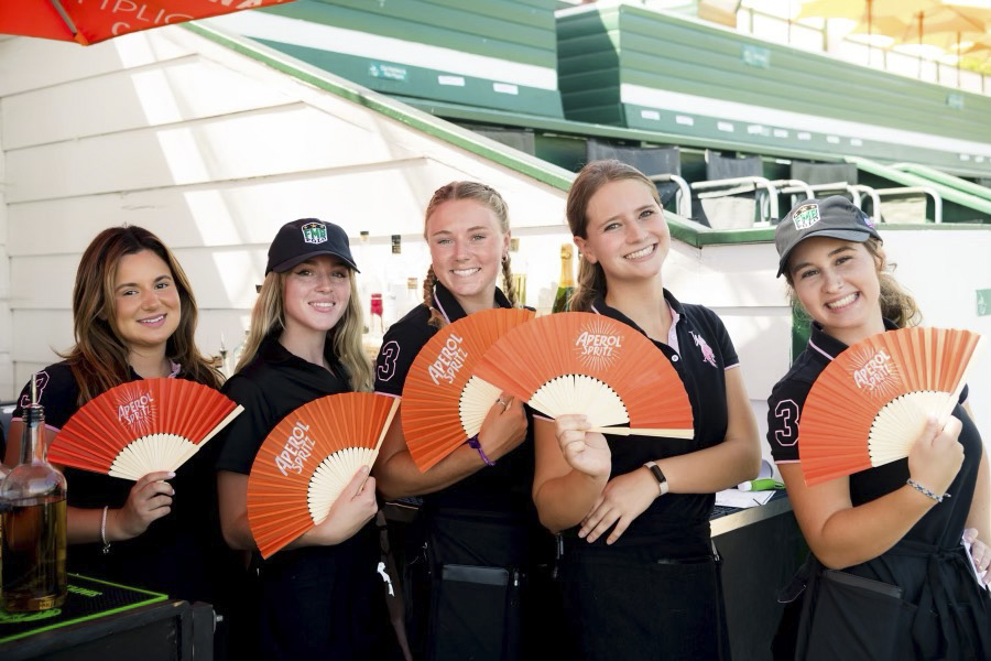 Aly Springer photographed with her coworkers at the Santa Barbara Polo and Racquet Club in Carpinteria, Calif. Photo provided courtesy of Springer.