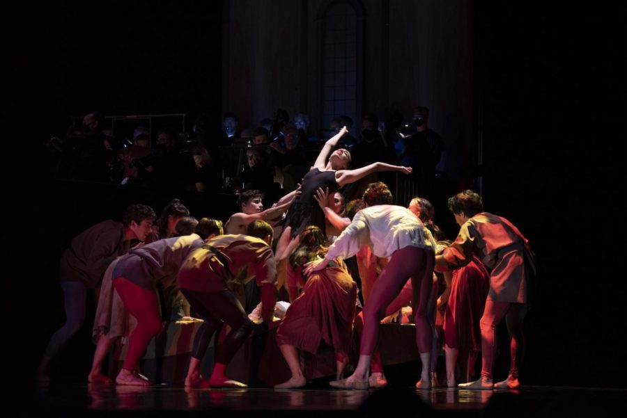 State Street Ballet dancers reach up to Leeza Domrachev (center) after tearing off her swan costume on Oct. 16 at the Granada Theater in Santa Barbara, Calif. Light and dark imagery weaved a common thread through William Soleau’s choreographic choices during the performance.