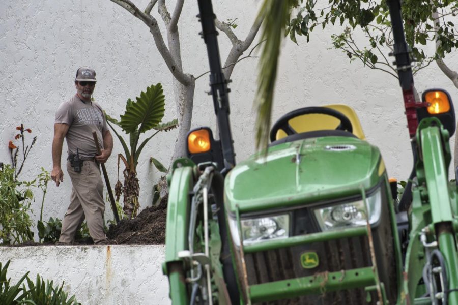 Groundskeeper Dan Gaffney shovels mulch into a recently deweeded area near the City College music building on Sept. 30 in Santa Barbara, Calif. The mulch made from recycled debris is provided for free by the City of Santa Barbara and is used sustainably to prevent weeds.