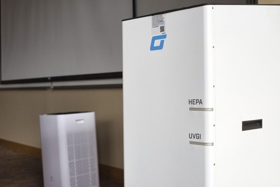 Two air filter units pictured in City College lecture hall A211 on Sept. 30 in Santa Barbara, Calif. City College aims to reduce energy consumption by replacing some of the old filter units (left) with larger air filters (right) that feature enhanced cooling and efficiency.