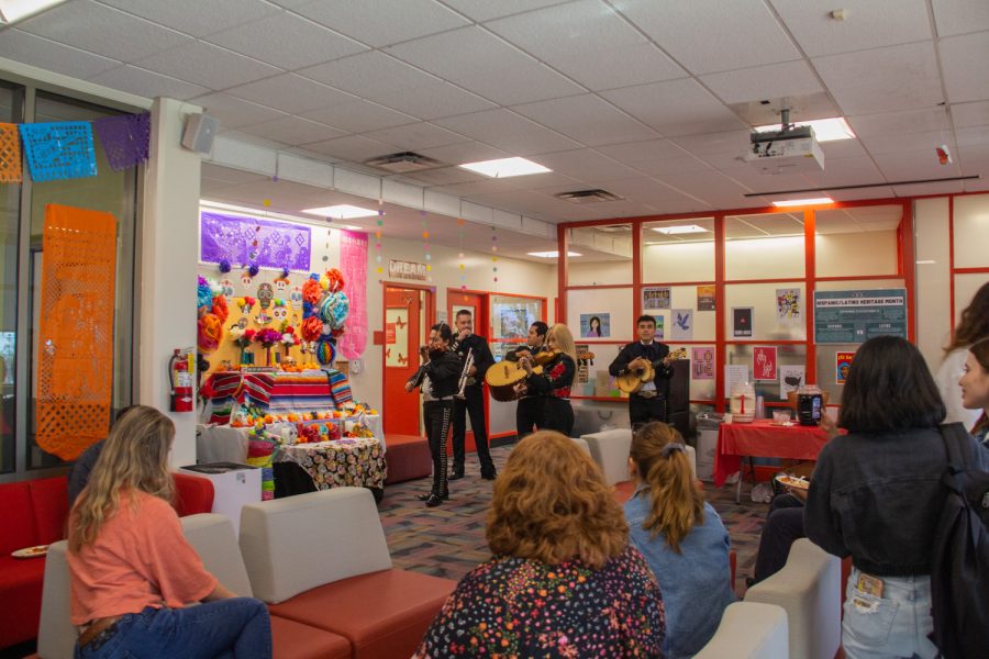 Staff and students enjoying listening to the Mariachi band as they ate at the Dream Center grand opening on Oct. 19 at the Center for Equity & Social Justice in Santa Barbara, Calif. They had a buffet with enchiladas, beans and rice along with other traditional Mexican dishes.