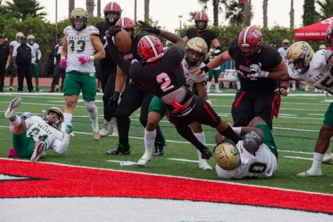 No. 2 Brandon Smith gets tackled, but not before he reaches the end zone to score one of three touchdowns during the game on Oct. 22 at La Playa Stadium in Santa Barbara, Calif. Smith rushed a total of 69 yards during the game.