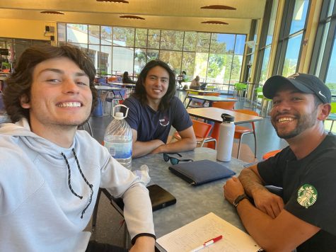 Jake Miller, Stefano Peluso, and Tristan Morales sitting at the cafeteria in the middle of a bible study. “I love showing people the truth about my lord and savior Jesus Christ, who died on the cross for the forgiveness of the world's sins,” Miller wrote.