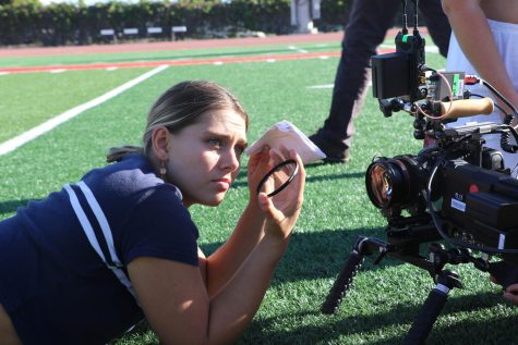 Manhattan Wood maintains the cameras filter on Oct. 29 at La Playa Stadium in Santa Barbara, Calif.