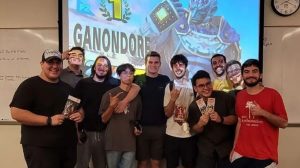 Nick Hernandez (far right) stands with club members in front of a projector screen at the Anime Club’s Oct. 19 Smash Ultimate tournament at City College in Santa Barbara, Calif. This image is provided courtesy of Hernandez.