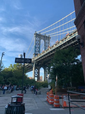 Cars, bikes, and people zoom by on Oct. 6 on the busy streets of Dumbo, Brooklyn as Clarissa Perez stops to take a picture. Perez was on a trip celebrating her twentieth birthday. “I was in New York and greatly appreciated the time I got to spend there,” Perez wrote. “It was amazing because I got to see all of my friends that moved to New York and even meet some new ones!”