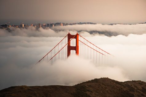 The golden gate bridge in a bed of clouds with the San Fransisco city in the back. “Like the bridge, joy will push through other feelings and pop out above everything else. Joy holds strong when it comes to life while also putting everything else in a better light then before it came in,” Nate Johnstone wrote. “Joy puts a perspective on things that allows us to view life in a better and happier manner. Like the red of the bridge, it reflects to others around and spreads out into the rest of the world.”