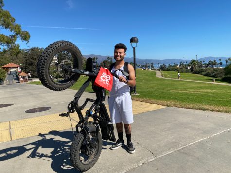 Josue Pule and his electric bike on Oct. 25 at City College in Santa Barbara, Calif. He uses this bike to get to school and back.