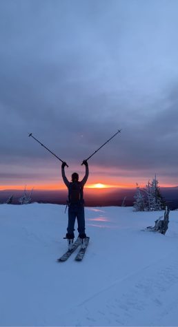 Manhattan Wood standing with his skis at 5:30 a.m. at the Cascade Mountain Range in Oregon. “There is nothing like an alpine sunrise, crisp air, and the view of a lifetime,” Wood wrote.