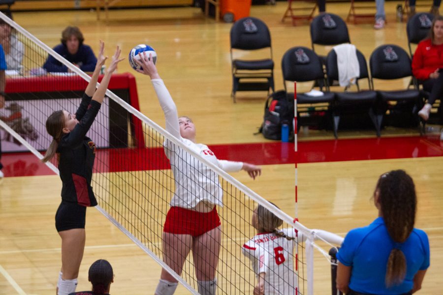 Setter Mikayla Butzke tips the ball over the net trying to get a point for the Vaqueros on Nov. 19 in the Sports Pavillion at City College in Santa Barbara, Calif. Butzke was able to push the ball away from the opposing Saddleback blocker.